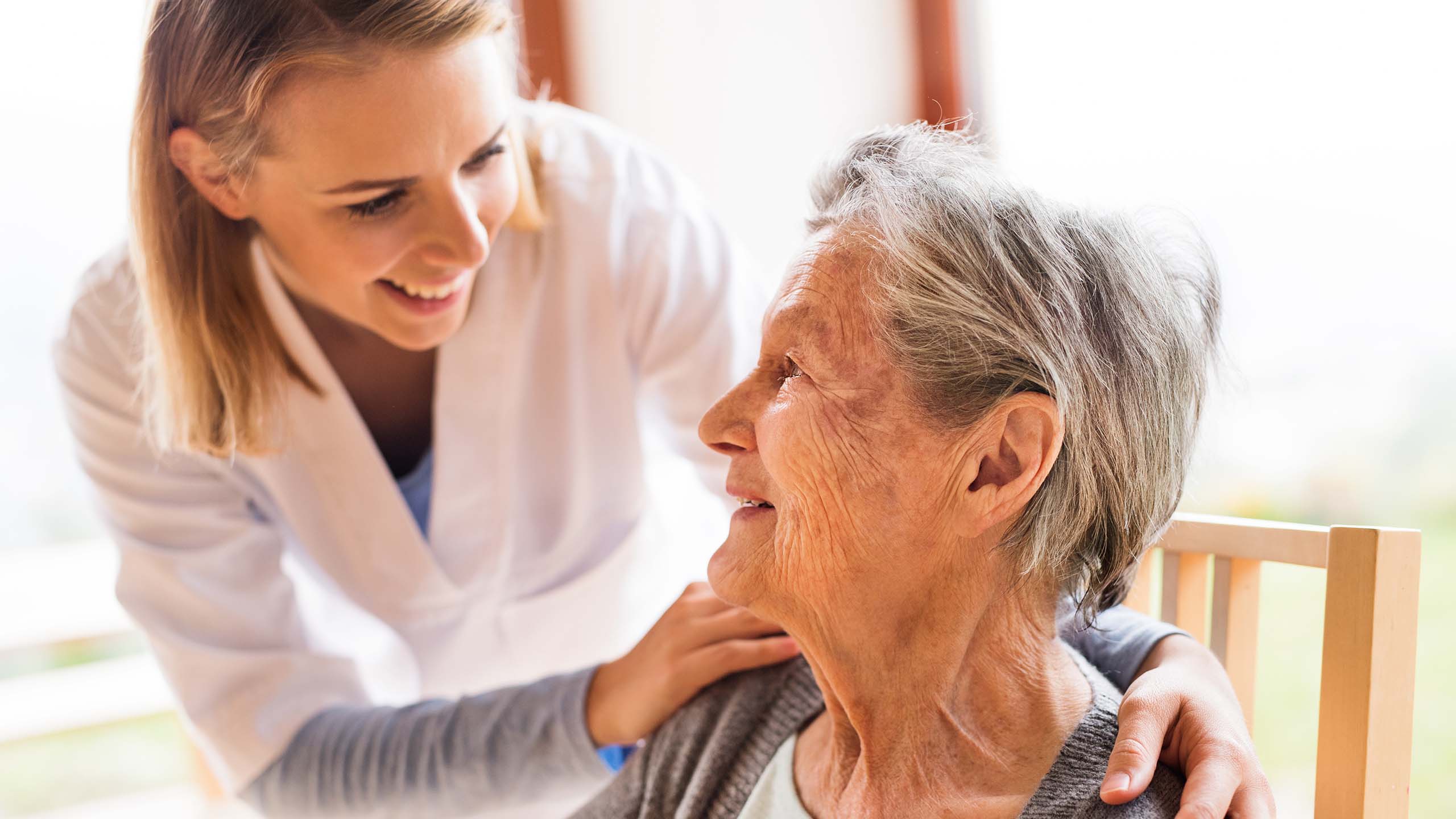 Nurse helping senior