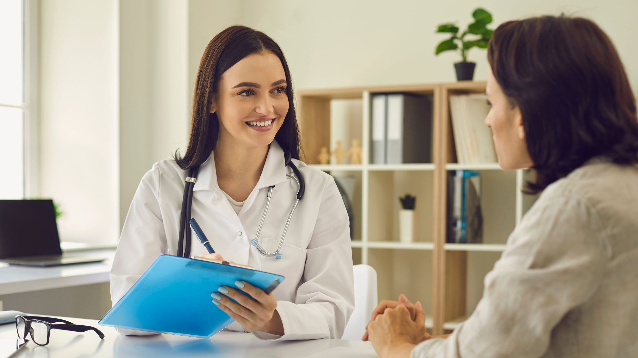 Nurse talking to patient
