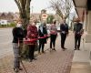 Local government officials cutting the ribbon at the Flowerstone Health Clinic in Qualicum Beach.