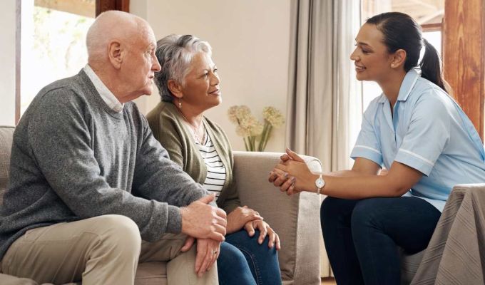 nurse helping seniors